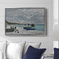 The Beach at Sainte-Adresse, 1867 by Claude Monet displayed above a sofa in a living room in a silver floater frame, featuring a lively beach scene with people overlooking water and ships.