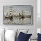 Ships Riding on the Seine at Rouen, 1872 by Claude Monet displayed above a sofa in a living room in a silver floater frame, featuring an impressionist river scene with anchored sailing ships and reflections.