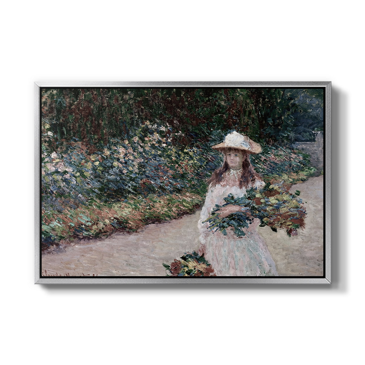 Young Girl in the Garden at Giverny, 1888 by Claude Monet in a silver floater framed canvas wall art display.