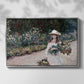 Front view of Young Girl in the Garden at Giverny, 1888 by Claude Monet in a silver floater framed canvas.
