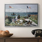 Garden at Sainte-Adresse, 1867 by Claude Monet in a silver floater framed canvas displayed above a console table in a hallway, featuring a landscaped terrace with figures and flags near shoreline.