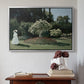 Silver floater framed canvas featuring Woman in the Garden, Sainte-Adresse, 1867 by Claude Monet above an entryway table in a minimalist foyer.
