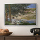On the Bank of the Seine, Bennecourt, 1868 by Claude Monet in a silver floater framed canvas displayed above a console table in a hallway, featuring a quiet outdoor setting with figures near river under foliage.