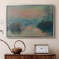 Silver floater framed canvas featuring an impressionist view of river at sunset with snowy banks, displayed above a cabinet in a soft-toned living room.