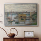Silver floater framed canvas featuring a calm water scene with bridge fading into cloudy sky, displayed above a cabinet in a soft-toned living room.