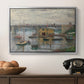 Bridge at Argenteuil on a Gray Day, c. 1876 by Claude Monet in a silver floater framed canvas displayed above a console table in a hallway, featuring a subdued urban landscape with structure spanning river.