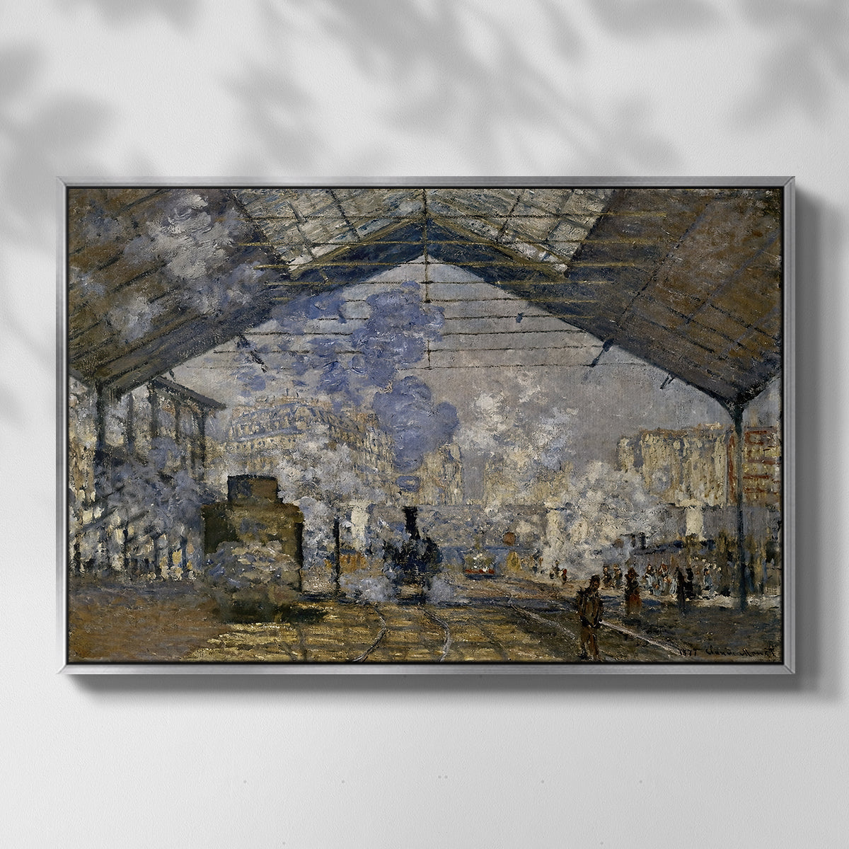Front view of The Gare Saint-Lazare, 1877 by Claude Monet in a silver floater framed canvas.