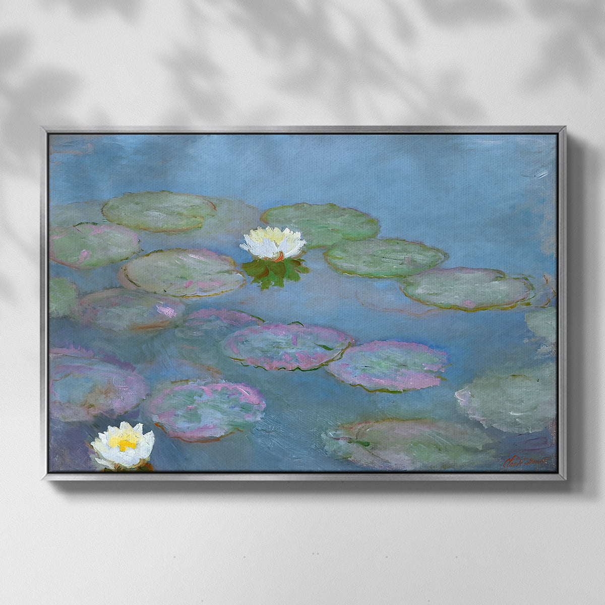 Front view of Water Lilies (Nymphéas), 1897-1899 by Claude Monet in a silver floater framed canvas.