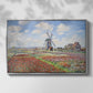 Front view of Tulip Fields with the Rijnsburg Windmill, 1886 by Claude Monet in a silver floater framed canvas.