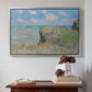 Silver floater framed canvas featuring The Cliff Walk at Pourville, 1882 by Claude Monet above an entryway table in a minimalist foyer.