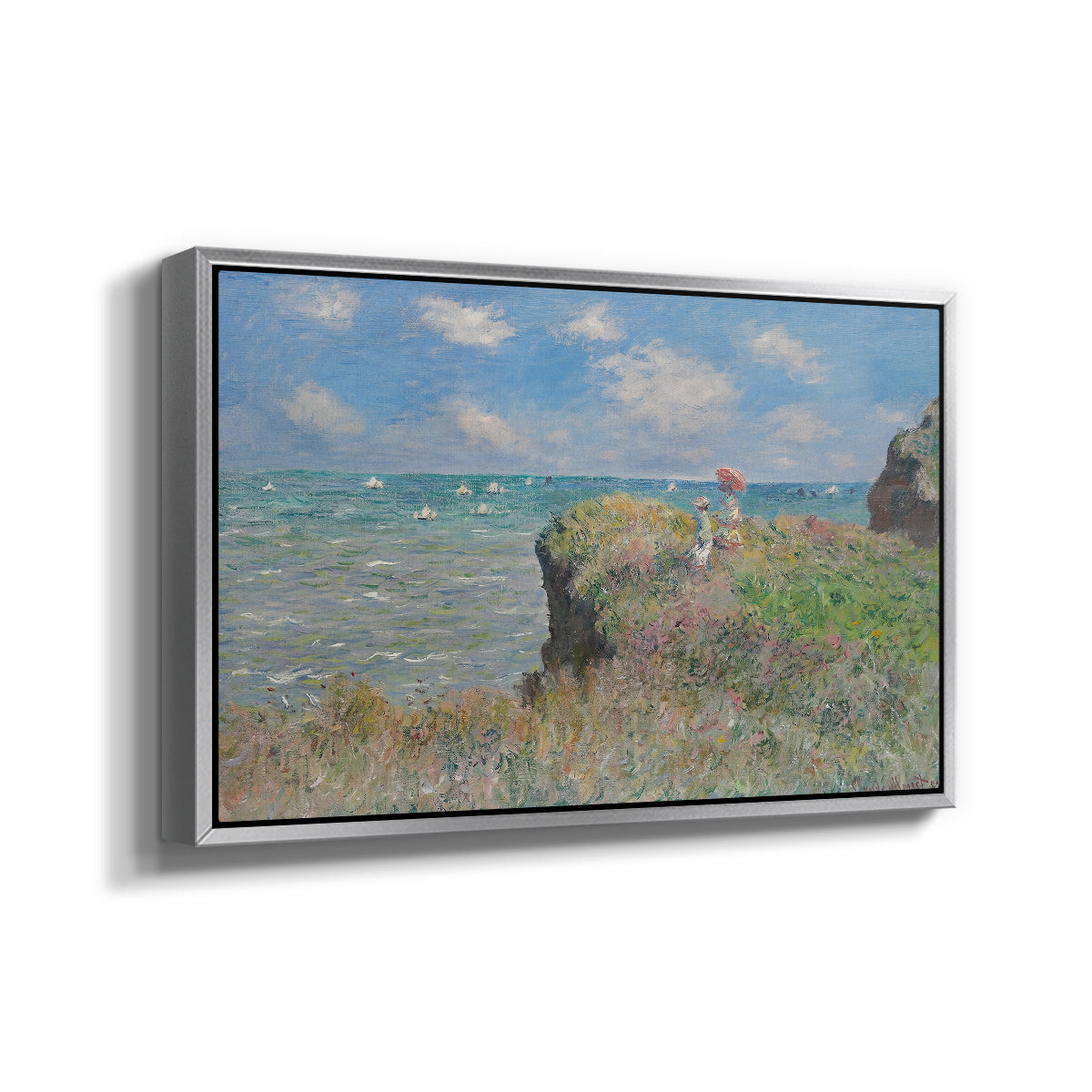 Angled view of The Cliff Walk at Pourville, 1882 by Claude Monet in a silver floater framed canvas.