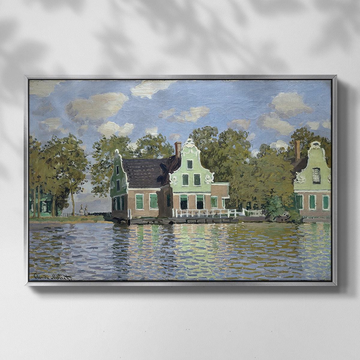 Front view of Houses on the Zaan River at Zaandam, 1871 by Claude Monet in a silver floater framed canvas.