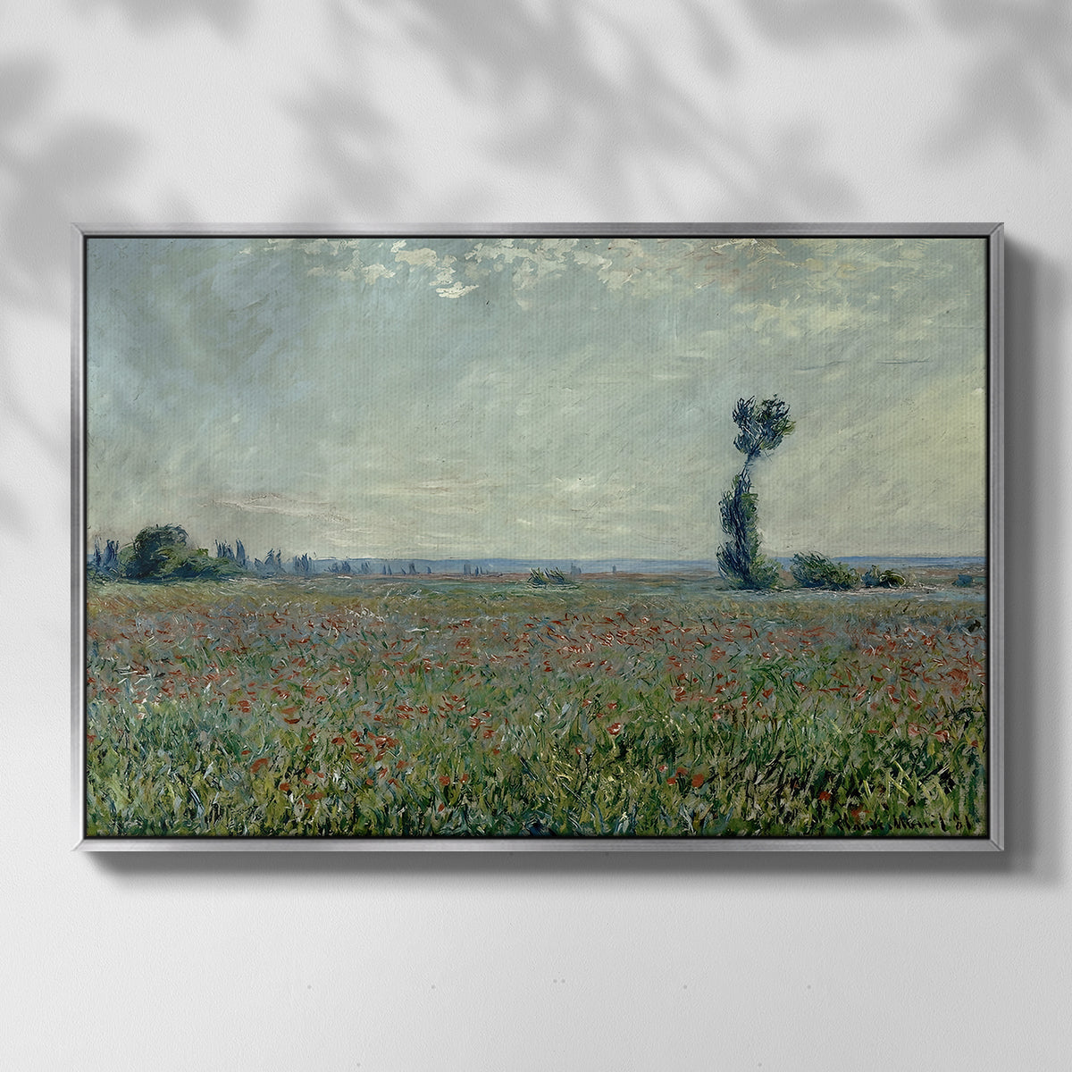 Front view of Poppy Field, 1881 by Claude Monet in a silver floater framed canvas.