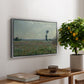 Poppy Field, 1881 by Claude Monet, presented in a silver floater framed canvas featuring a wide field of red poppies stretching across countryside under open sky, displayed above a hallway console table.