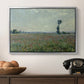 Poppy Field, 1881 by Claude Monet in a silver floater framed canvas displayed above a console table in a hallway, featuring a natural field scene with vibrant red flowers.