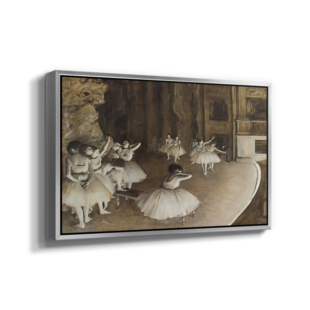 Angled view of The Rehearsal of the Ballet Onstage, 1874 by Edgar Degas in a silver floater framed canvas.
