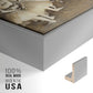 Close-up of the silver floater frame corner and gallery wrapped canvas construction.