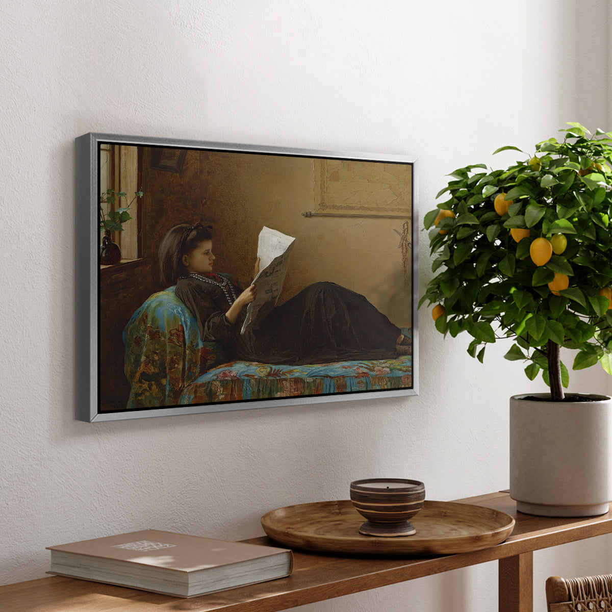 Interesting News, 1872 by Eastman Johnson, presented in a silver floater framed canvas featuring a group of people gathered indoors reading newspaper together, displayed above a hallway console table.