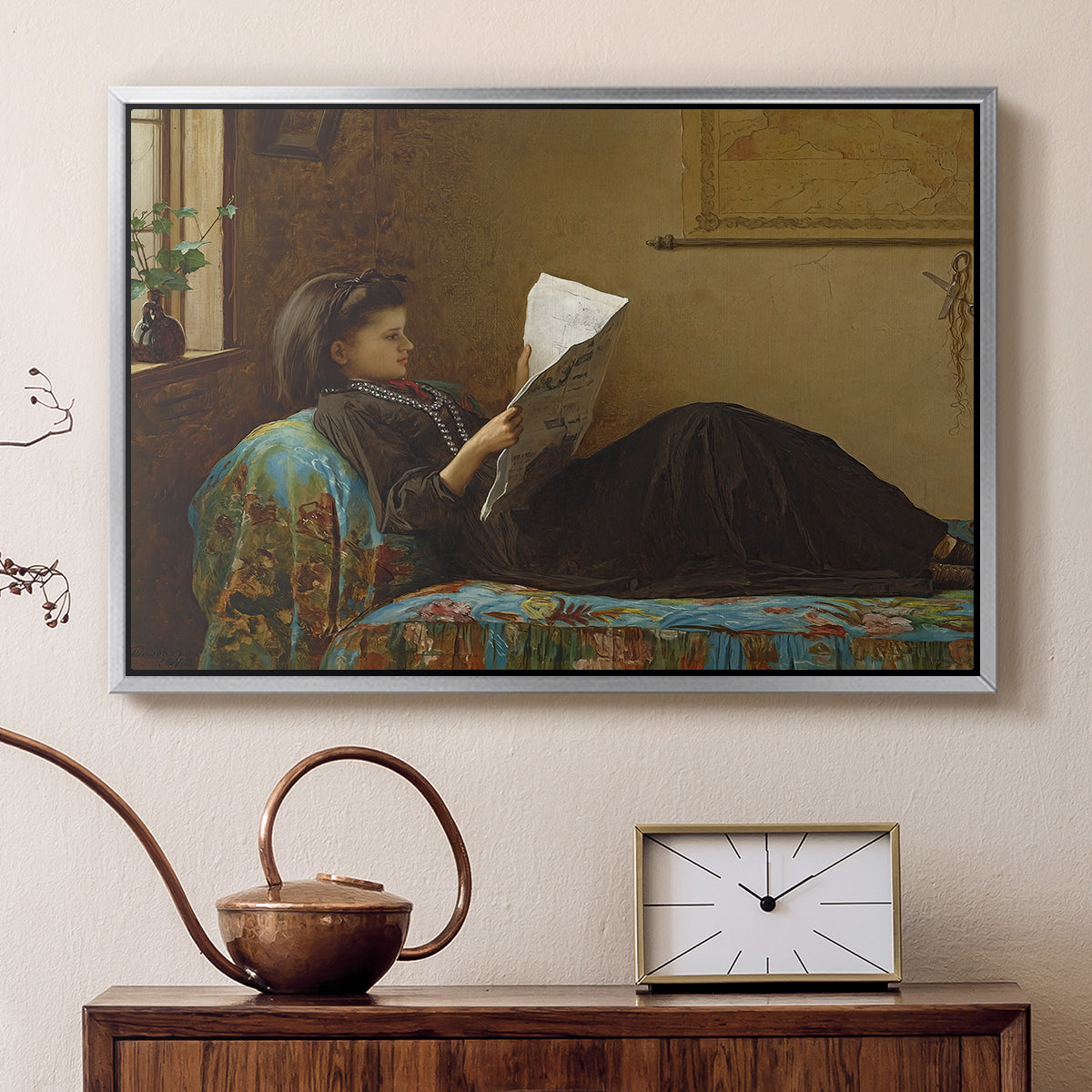 Silver floater framed canvas featuring an Americana interior with people focused on printed page, displayed above a cabinet in a soft-toned living room.