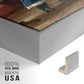 Close-up of the silver floater frame corner and gallery wrapped canvas construction.