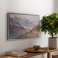 Odenwinklkees with the Johannisberg, 1902 by Edward Theodore Compton, presented in a silver floater framed canvas featuring an alpine glacier landscape with rugged peaks and snow-covered terrain, displayed above a hallway console table.
