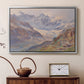 Silver floater framed canvas featuring a realistic depiction of high-altitude snowy peaks, displayed above a cabinet in a soft-toned living room.
