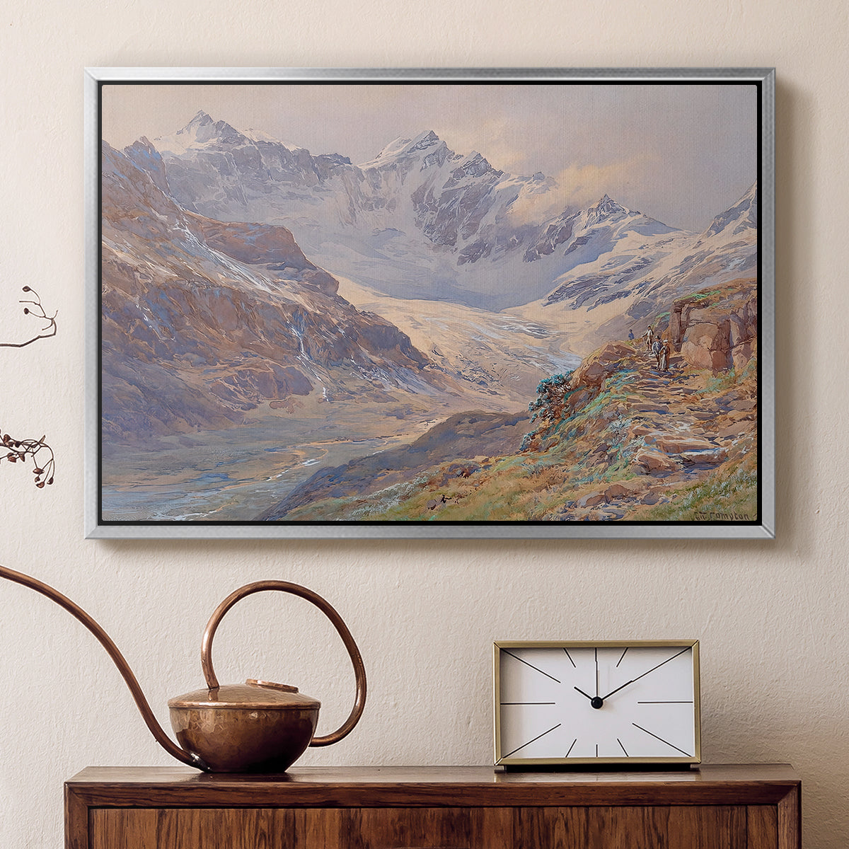 Silver floater framed canvas featuring a realistic depiction of high-altitude snowy peaks, displayed above a cabinet in a soft-toned living room.