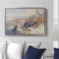 Col du Géant, 1903 by Edward Theodore Compton displayed above a sofa in a living room in a silver floater frame, featuring a high mountain landscape featuring dramatic ridges and glacier terrain.