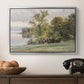 Landscape at Lake Starnberg, 1890 by Edward Theodore Compton in a silver floater framed canvas displayed above a console table in a hallway, featuring a tranquil lakeside view with soft atmospheric tones.