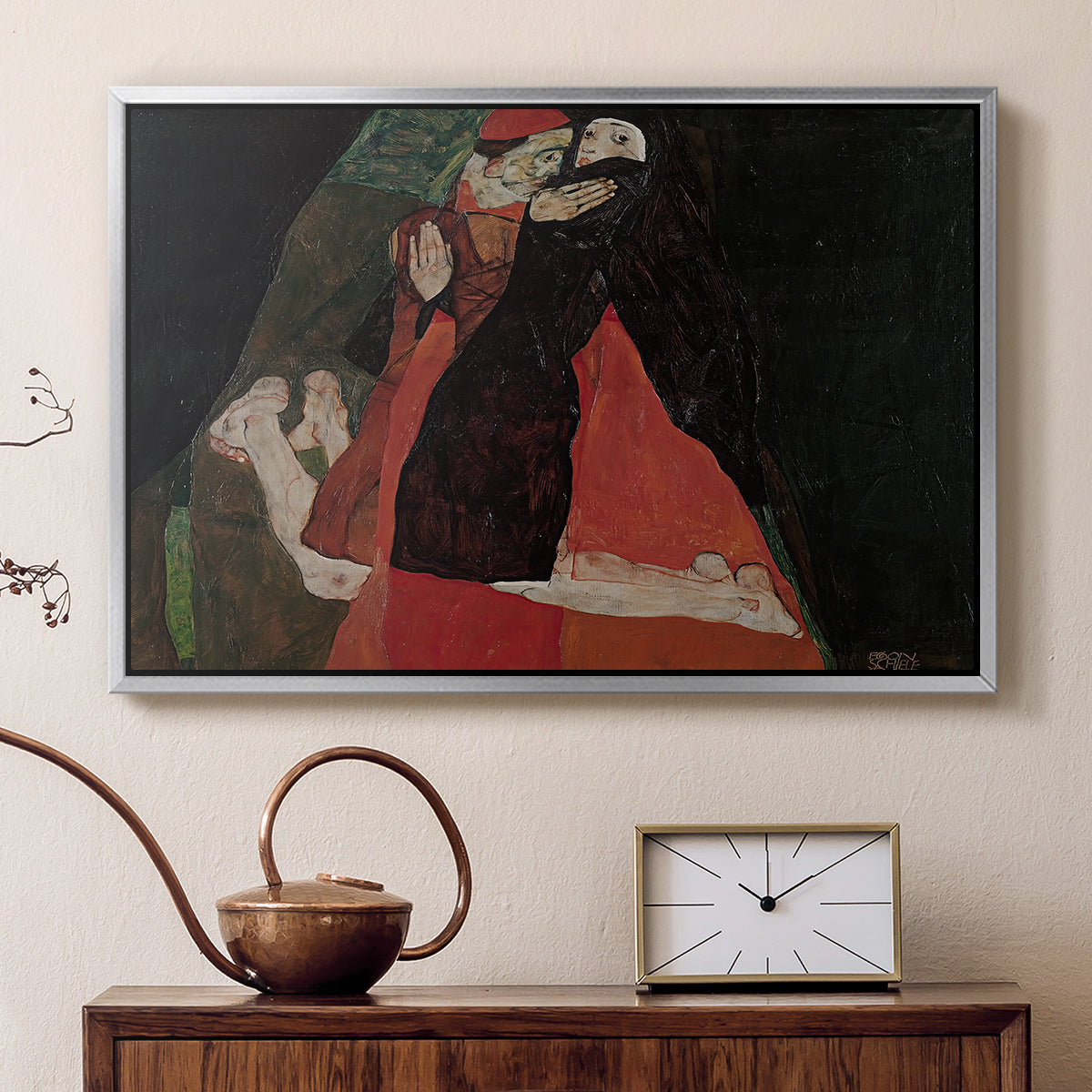 Silver floater framed canvas featuring an expressive painting of figures entwined with bold lines and color, displayed above a cabinet in a soft-toned living room.