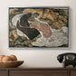 Death and the Maiden, 1915 by Egon Schiele in a silver floater framed canvas displayed above a console table in a hallway, featuring an intense composition exploring life and death through figures.