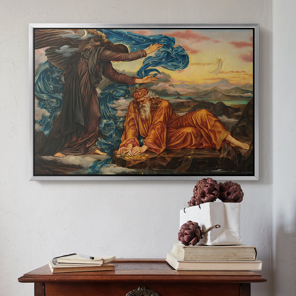 Silver floater framed canvas featuring Earthbound, 1897 by Evelyn De Morgan above an entryway table in a minimalist foyer.