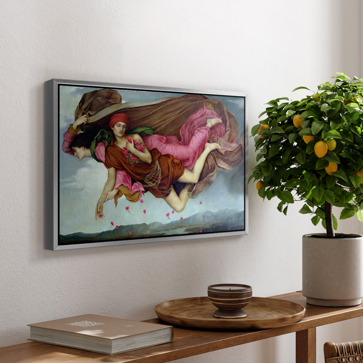 Night and Sleep, 1878 by Evelyn De Morgan, presented in a silver floater framed canvas featuring two intertwined female figures floating through dark sky representing night and sleep, displayed above a hallway console table.