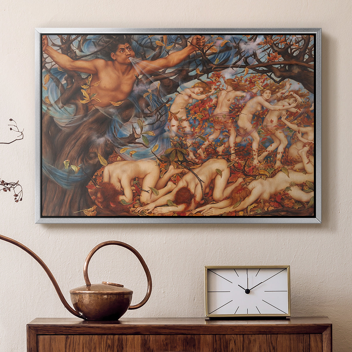 Silver floater framed canvas featuring an energetic depiction of figures swept through air by wind, displayed above a cabinet in a soft-toned living room.