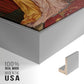 Close-up of the silver floater frame corner and gallery wrapped canvas construction.