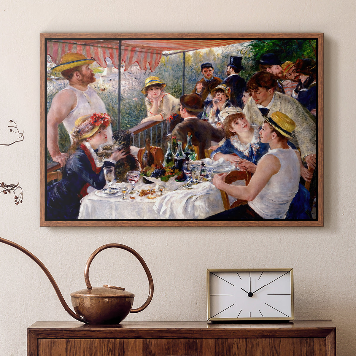 Walnut floater framed canvas featuring an impressionist scene of friends enjoying lunch with wine and conversation, displayed above a cabinet in a soft-toned living room.