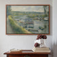 Walnut floater framed canvas featuring Wash-House Boat at Bas-Meudon, c. 1874 by Pierre-Auguste Renoir above an entryway table in a minimalist foyer.