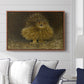 An Eagle Owl (Berguv), 1905 by Bruno Liljefors displayed above a sofa in a living room in a walnut floater frame, featuring a detailed wildlife painting of eagle owl with piercing eyes in darkness.