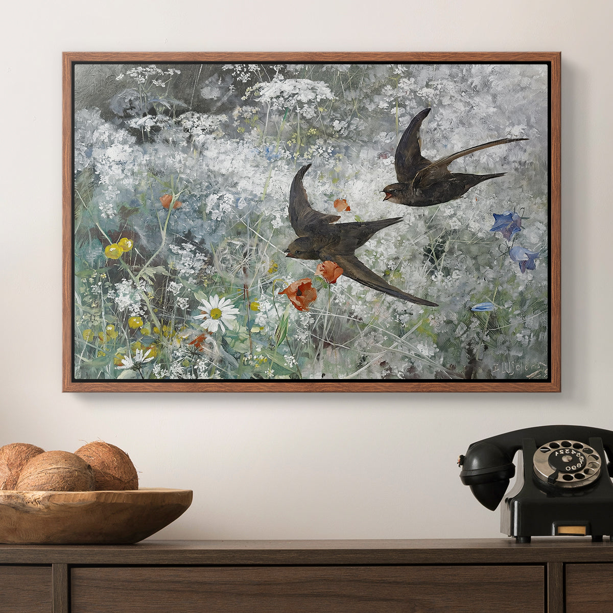 Common Swifts, 1886 by Bruno Liljefors in a walnut floater framed canvas displayed above a console table in a hallway, featuring an impressionist wildlife scene capturing birds in motion.