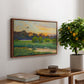 Flying Duck at Sunset, 1924 by Bruno Liljefors, presented in a walnut floater framed canvas featuring a wild duck flying over a sunset marsh with trees, displayed above a hallway console table.