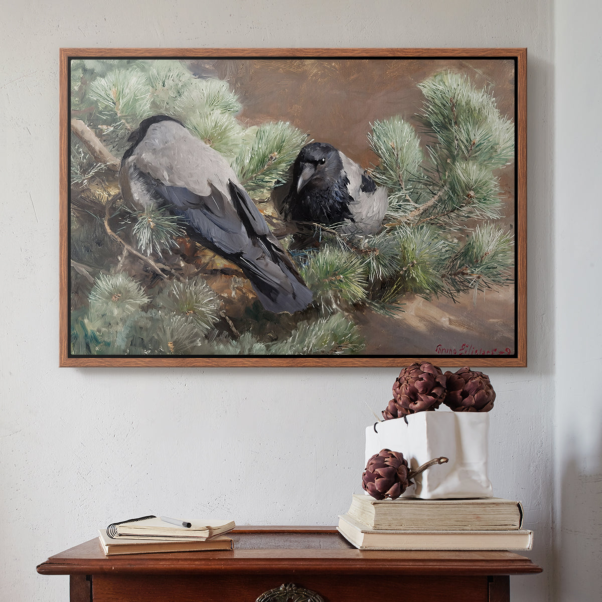 Walnut floater framed canvas featuring Hooded Crows (Kråkor), 1891 by Bruno Liljefors above an entryway table in a minimalist foyer.