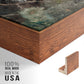 Close-up of the walnut floater frame corner and gallery wrapped canvas construction.