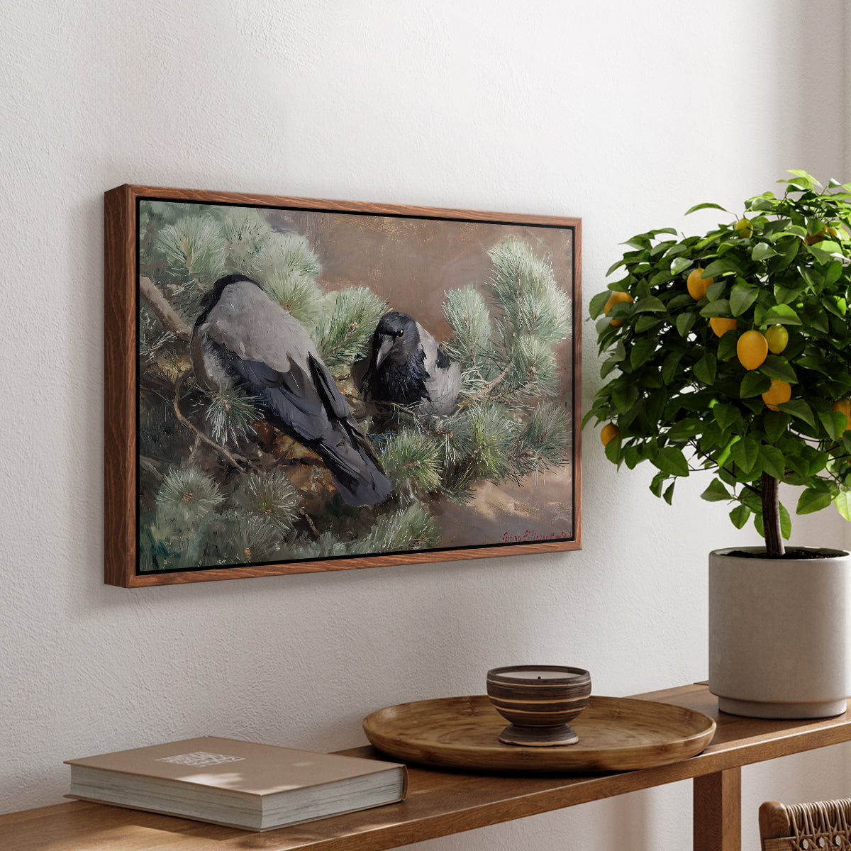 Hooded Crows (Kråkor), 1891 by Bruno Liljefors, presented in a walnut floater framed canvas featuring two crows perched on ground among grass and earth tones, displayed above a hallway console table.