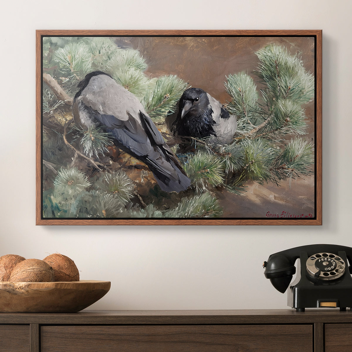 Hooded Crows (Kråkor), 1891 by Bruno Liljefors in a walnut floater framed canvas displayed above a console table in a hallway, featuring a wildlife painting of dark birds against muted landscape.