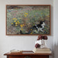 Walnut floater framed canvas featuring Cat on a Flowery Meadow, 1887 by Bruno Liljefors above an entryway table in a minimalist foyer.