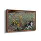 Angled view of Cat on a Flowery Meadow, 1887 by Bruno Liljefors in a walnut floater framed canvas.