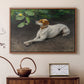 Walnut floater framed canvas featuring an animal painting of dog stretched out on earthy terrain, displayed above a cabinet in a soft-toned living room.