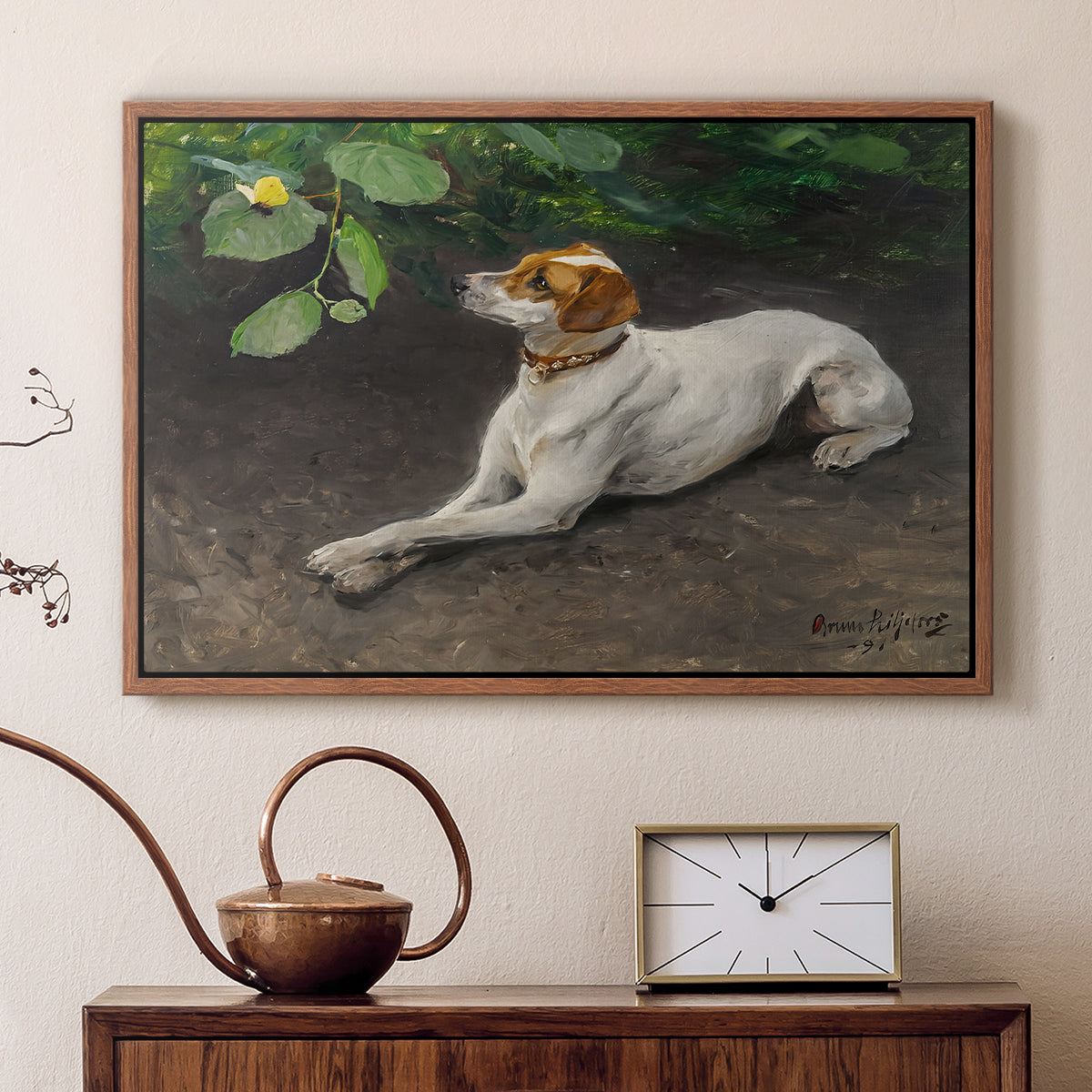 Walnut floater framed canvas featuring an animal painting of dog stretched out on earthy terrain, displayed above a cabinet in a soft-toned living room.