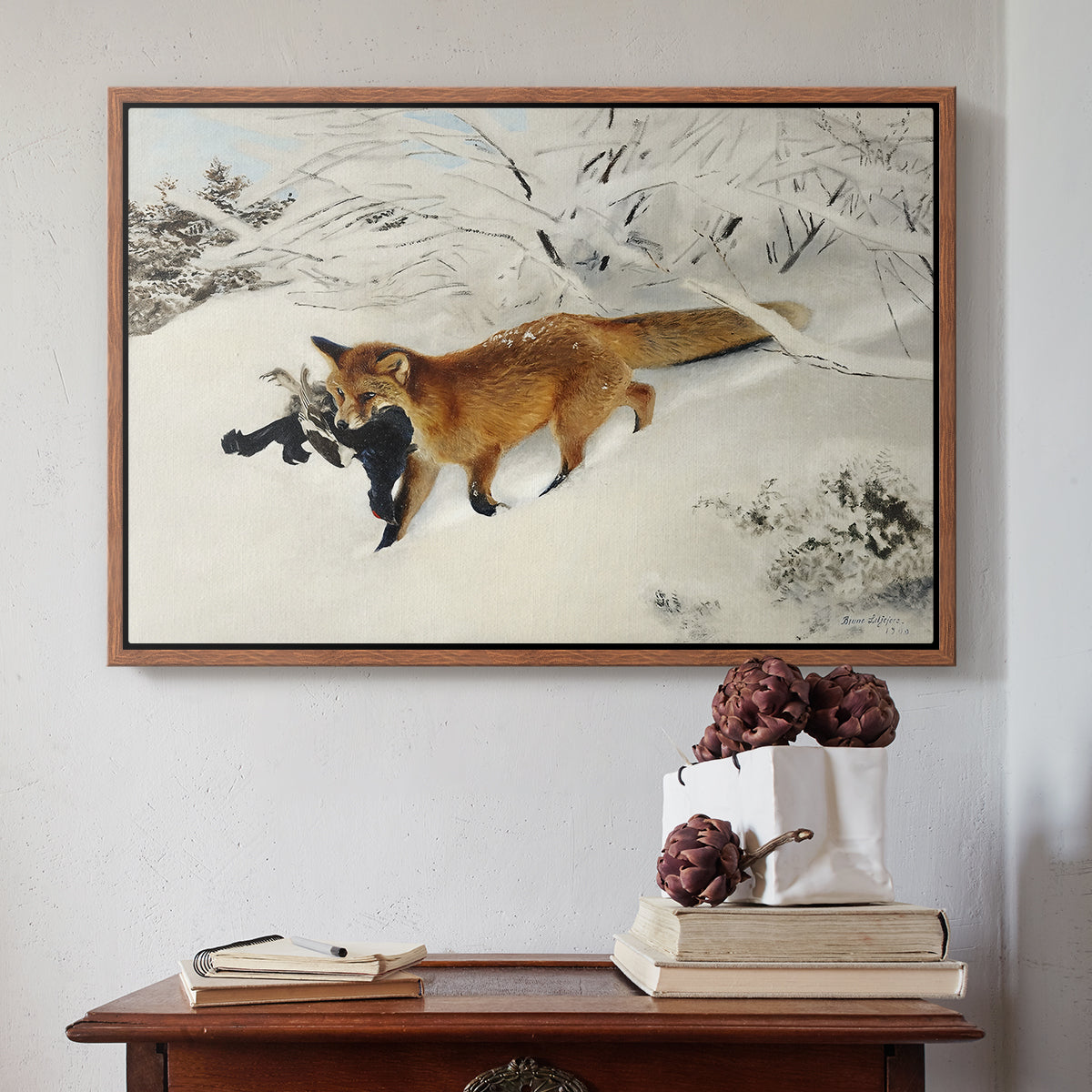Walnut floater framed canvas featuring Fox in Snow Landscape, 1900 by Bruno Liljefors above an entryway table in a minimalist foyer.