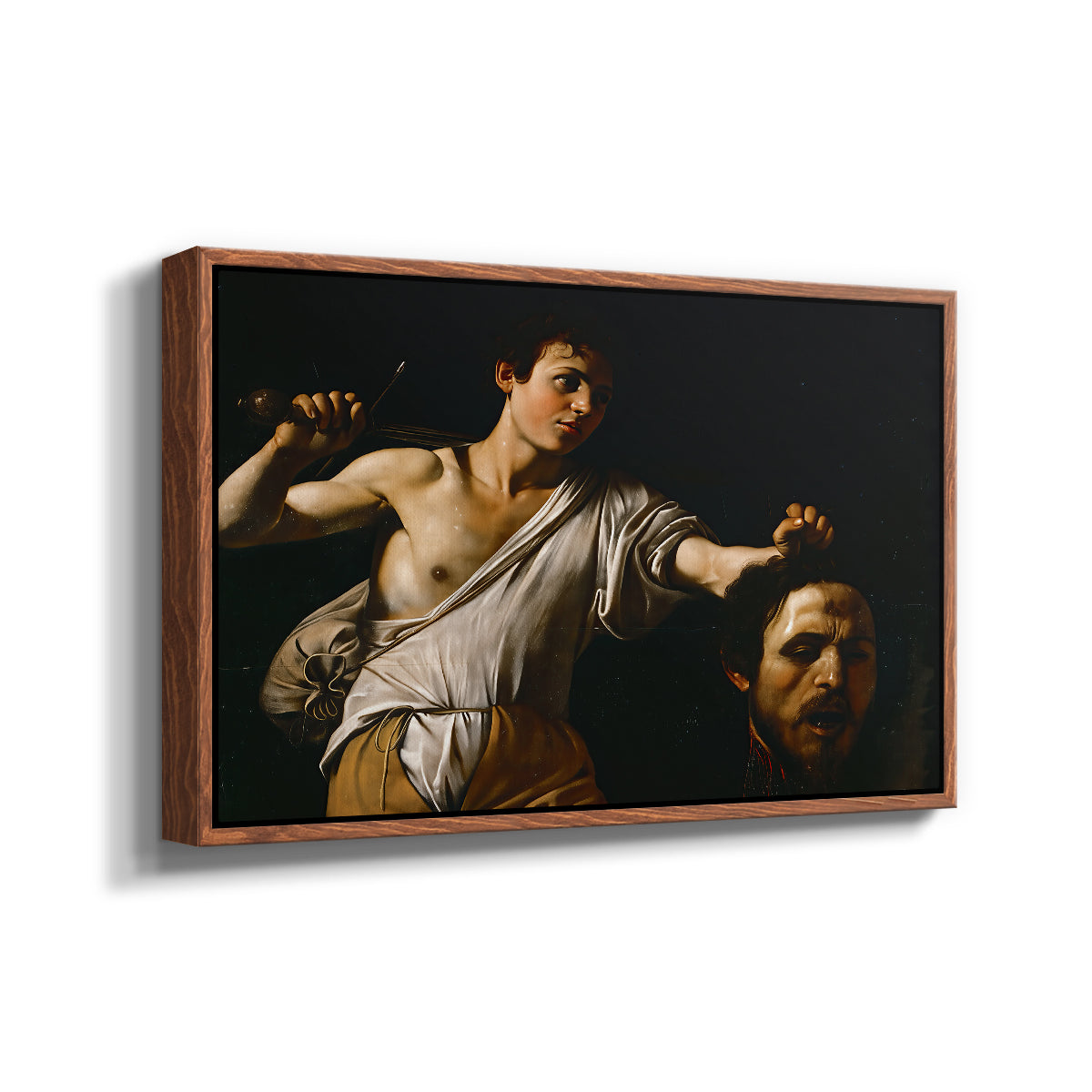 Angled view of David with the Head of Goliath (Vienna Version), c. 1607 by Caravaggio in a walnut floater framed canvas.